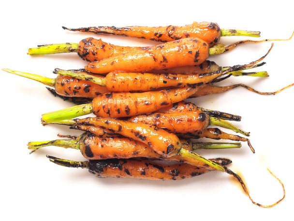 Caramelized baby carrots - Фото, изображение