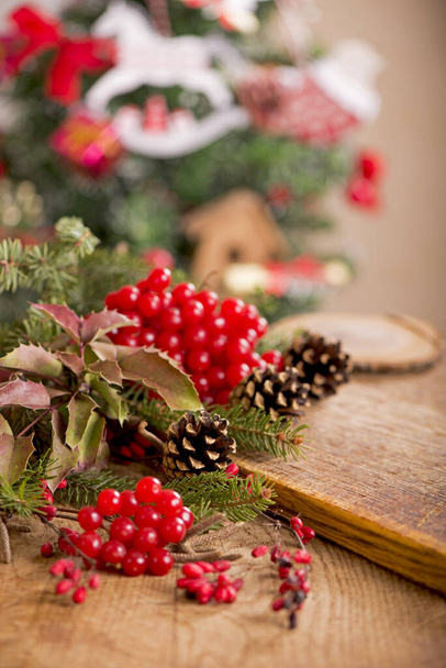 Christmas decoration on an old wooden background - Foto, afbeelding