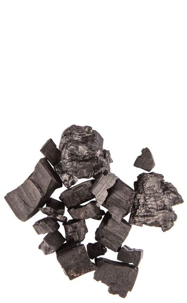 Petit morceau de charbon de bois sur fond blanc
 - Photo, image
