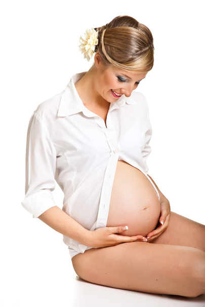 Pregnant woman isolated on white - Foto, Bild
