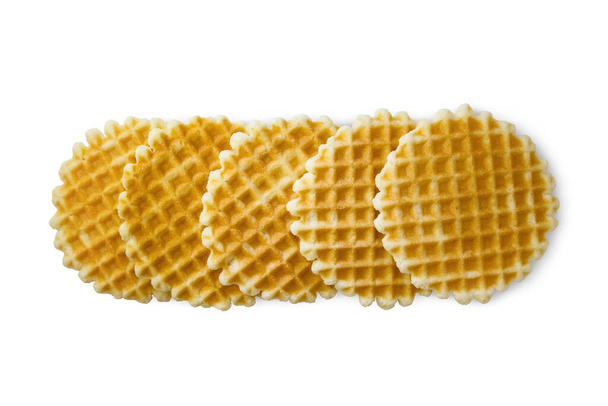 Round Belgian waffles isolated on white background, top view. Thin golden waffled cookie. - Foto, Imagen
