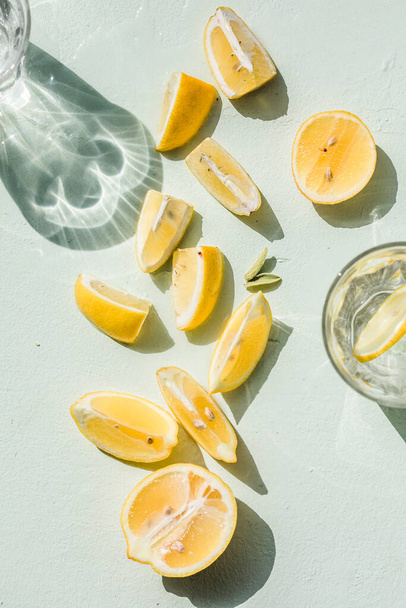 Summer composition made from lemon slice on white  background. Flat lay, top view - Photo, Image