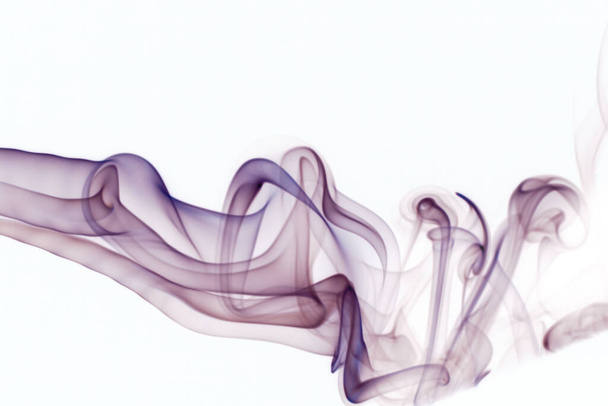 Movement of smoke, Abstract blue smoke on white background, blue background,blue ink background - Foto, imagen