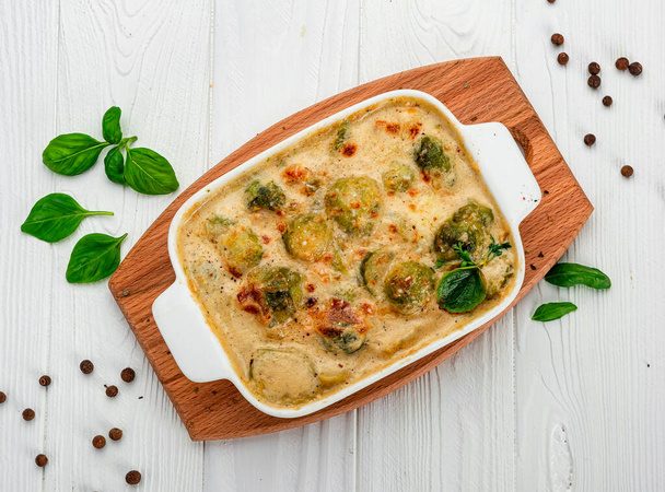 Fresh and beautiful Brussels sprout gratin. Serving food in a restaurant. Photo for the menu - Photo, Image