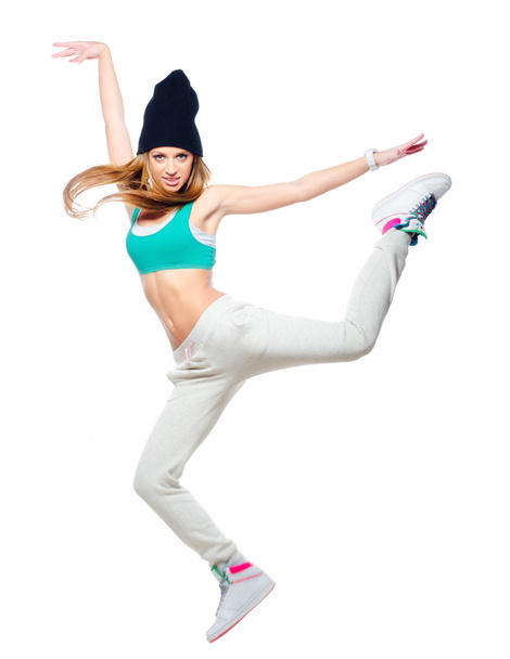 Hip hop dancer jumping high in the air isolated on white backgro - Фото, зображення