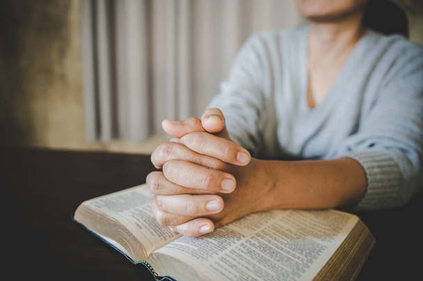 Man hands pray on bible. Concept of hope, faith, christianity, religion, church online. - Фото, зображення