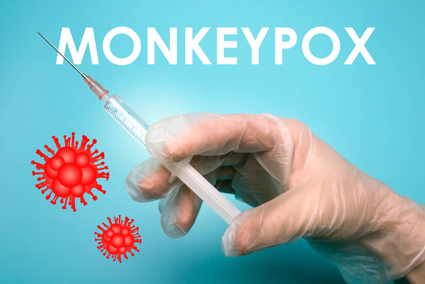 Majomhimlő elleni vakcina illusztrációja. A majomhimlő vírus által okozott fertőző betegség. Több országot érintő járvány, az új esetek. Vírusos zoonózis, veszélyes fertőzés. - Fotó, kép