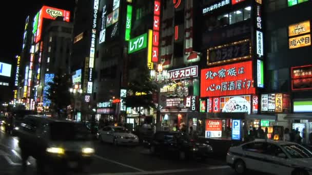Центрі Токіо області Shinjuku уночі - Кадри, відео