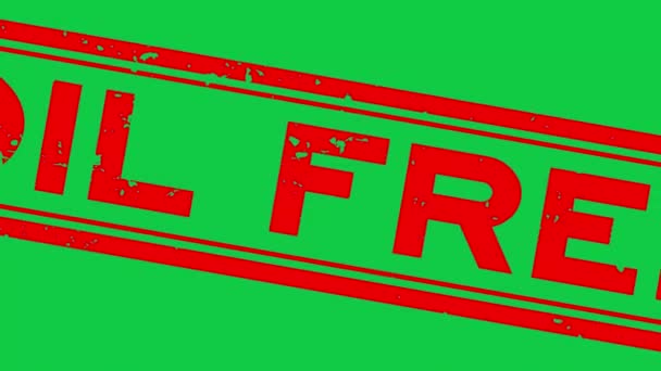 Grunge red oil free word rubber stamp zoom on green background - Filmagem, Vídeo