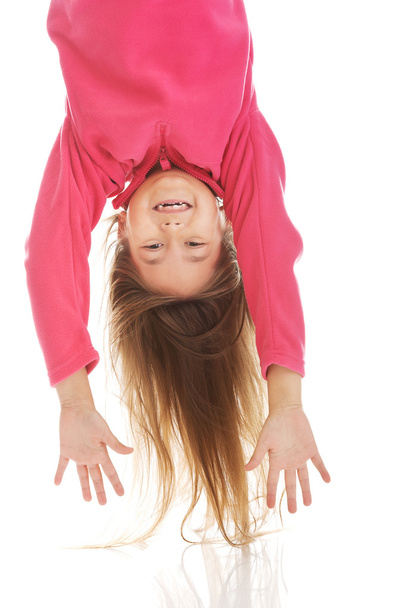 Girl hanging upside down - Fotoğraf, Görsel