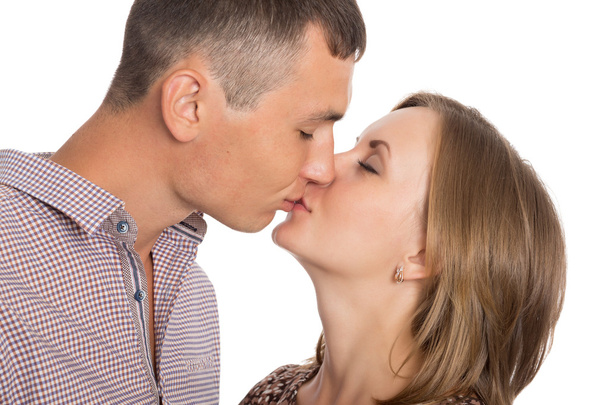Happy young couple kissing  - Fotó, kép