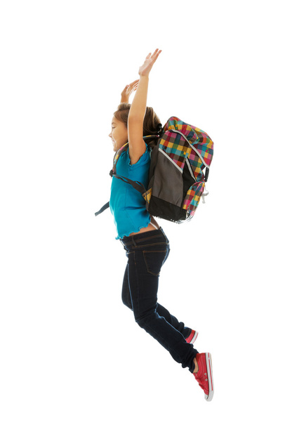 Girl with bag jumping high - Fotó, kép