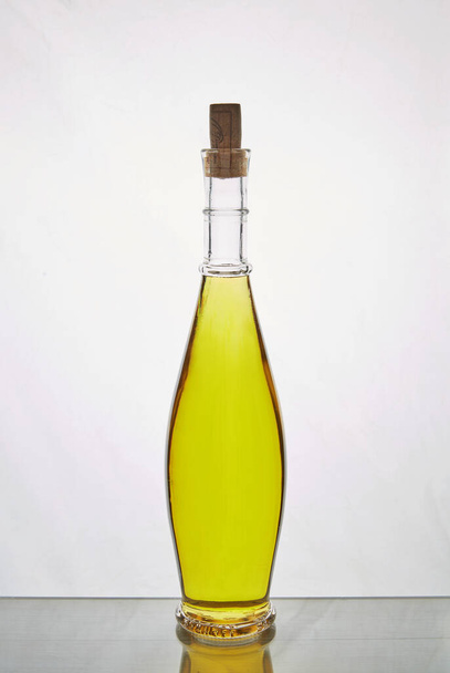 Bottle of olive oil on white - Fotoğraf, Görsel
