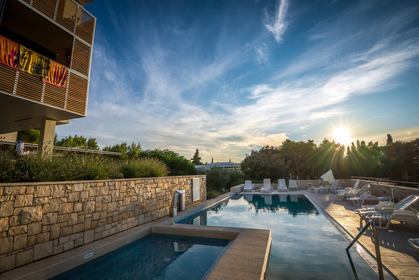 Hotel pool at Mediterranean coast - Foto, imagen