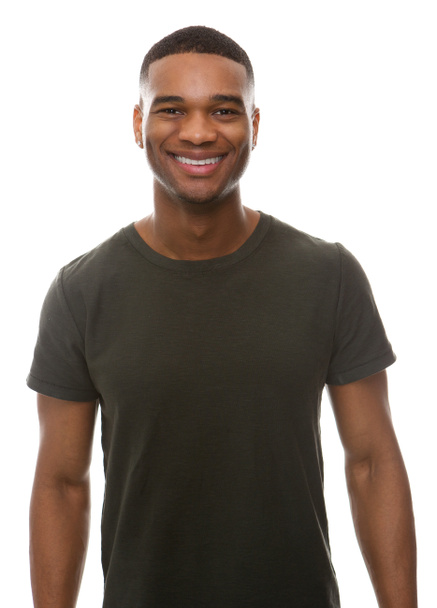 Glimlachend jongeman met groene t-shirt - Foto, afbeelding