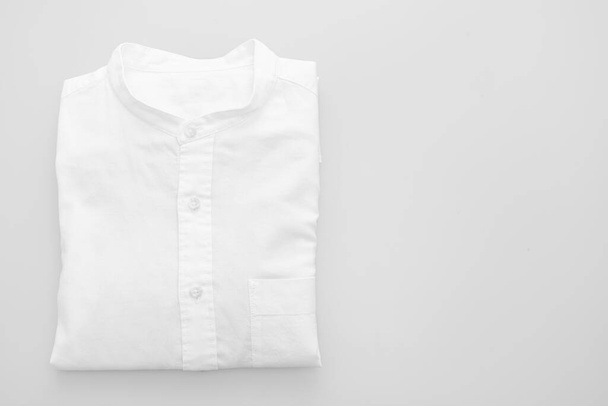 white shirt fold on white background - 写真・画像
