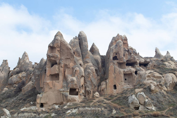 Mountains with cave houses at Goreme national park Turkey. - Fotoğraf, Görsel