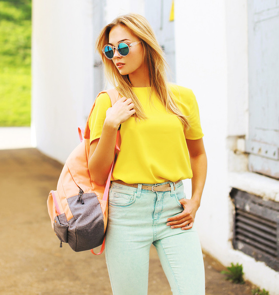 Summer street fashion, stylish hipster girl in sunglasses posing - Fotó, kép