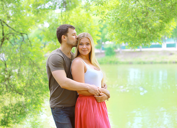 Pretty couple in love outdoors in summer day - Foto, Imagem