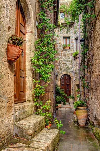 Alley in old town Pitigliano Tuscany Italy - Photo, Image