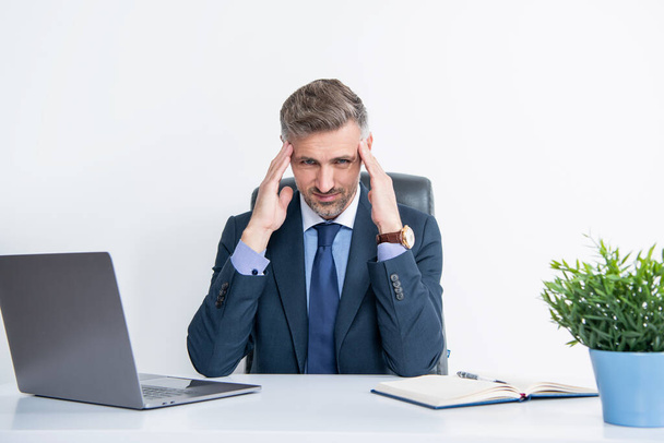 stressed overworked businessman sitting in business office - Фото, изображение