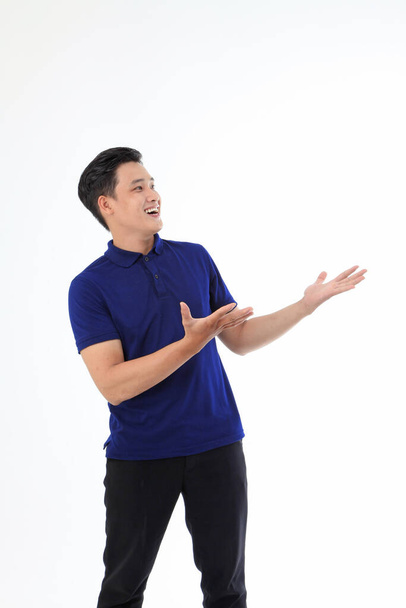 Asian young handsome man in collar shirt isolated on white background with hand gesture and face expression - Φωτογραφία, εικόνα