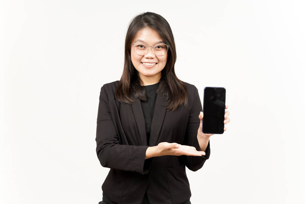 Showing Apps or Ads On Blank Screen Smartphone Of Beautiful Asian Woman Wearing Black Blazer - 写真・画像