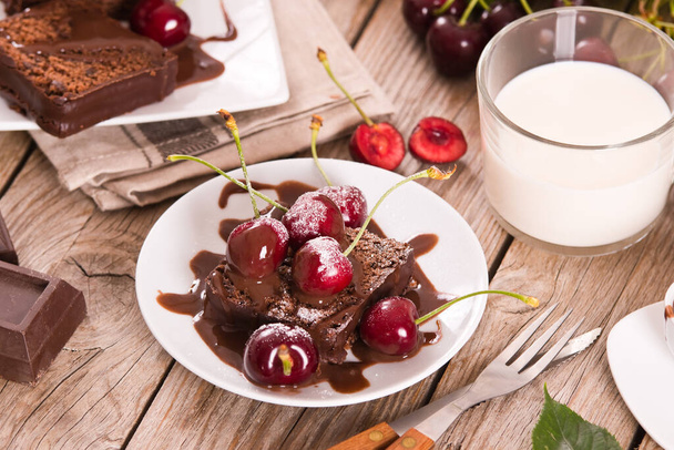 Chocolate pound cake with cherries. - Fotoğraf, Görsel