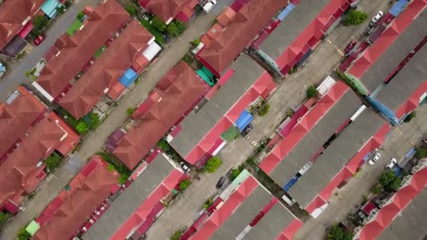 Aerial drone shot of suburb area surrounded by high density village in overpopulation city for housing and real estate property - Video, Çekim