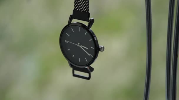 Elegant wrist watch. Close-up on a blurred background. - Video