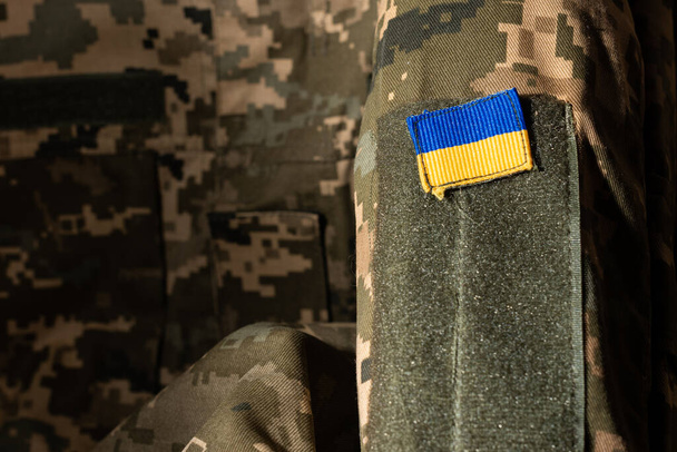 Primer plano de la superficie del uniforme militar. Fuerzas Armadas de Ucrania - Foto, Imagen