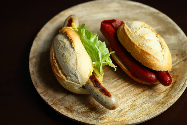 German bratwurst sausages in buns. - Foto, imagen