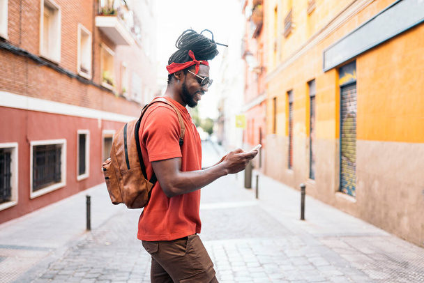 Cool Afro Boy Using Phone - Φωτογραφία, εικόνα