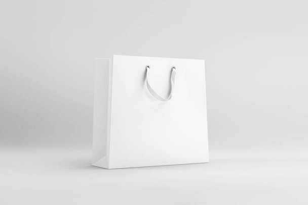 Bolsa de papel blanco aislada sobre fondo blanco. Representación 3D. Mock-up. - Foto, imagen