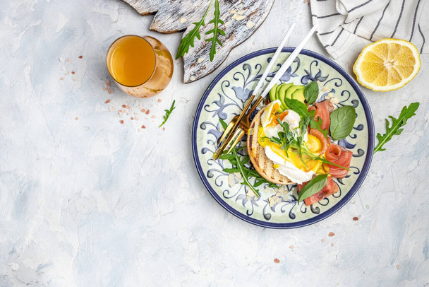 Healthy nutritious paleo keto breakfast diet avocado and Poached Egg, cheese, salmon and fresh salad, fresh juice, Keto breakfast or lunch. place for text, top view, - Fotoğraf, Görsel