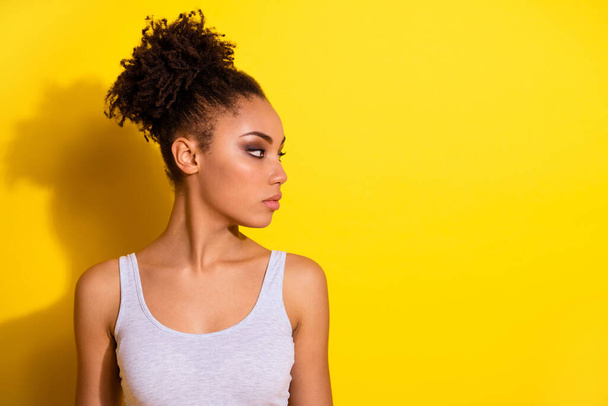 Profile portrait of calm focused person look empty space blank isolated on yellow color background - Φωτογραφία, εικόνα