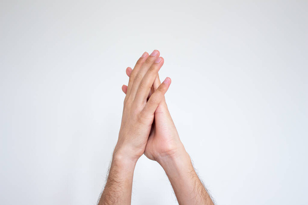 Hands applauding isolated on white background. Applause gesture, closeup. - Fotó, kép