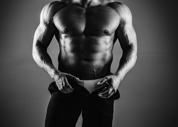Sexy naked body of a muscular man. - Valokuva, kuva