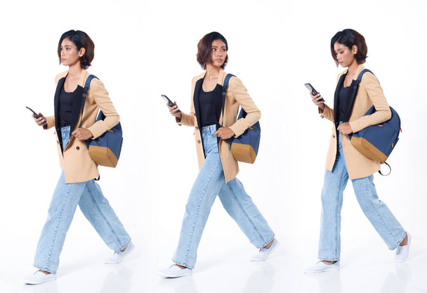 Collage Full length of Asian Indian 20s working woman with curl hair hold cell smart phone, backpack, blazzer and jean pants. Female walk forward side and work internet over white background isolated - Photo, Image