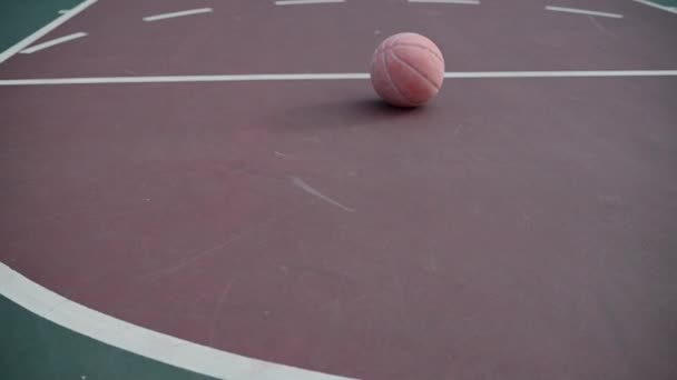 Basketball seen on free throw line of court - Footage, Video