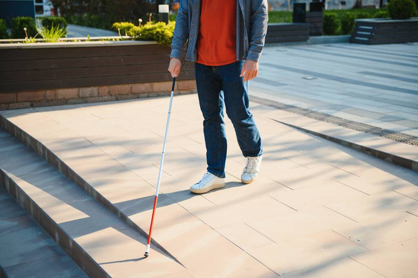 Close-up Of A Blind Man Standing With White Stick On Street. - Photo, Image