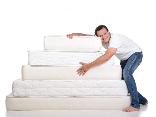 Family and many mattresses - Foto, Bild