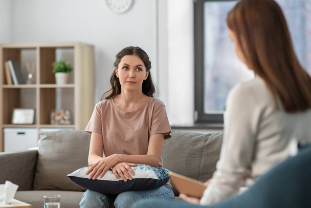 woman and psychologist at psychotherapy session - Photo, image