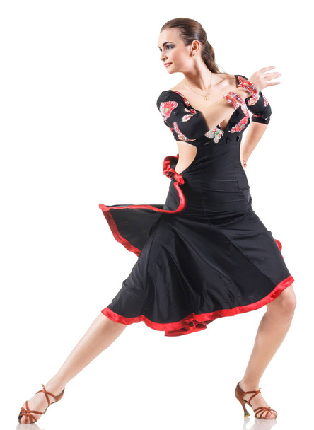studio portrait of young attractive woman dancing flamenco - Фото, изображение