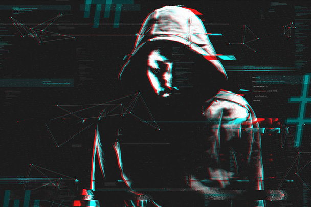 Computer hacker and cyber criminal, digitally enhanced image with grunge and glitch effect. Cyebrcrime and data breach concept. - Fotó, kép