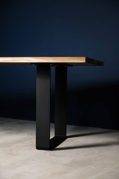 natural wood, black metal, table for interior - Φωτογραφία, εικόνα