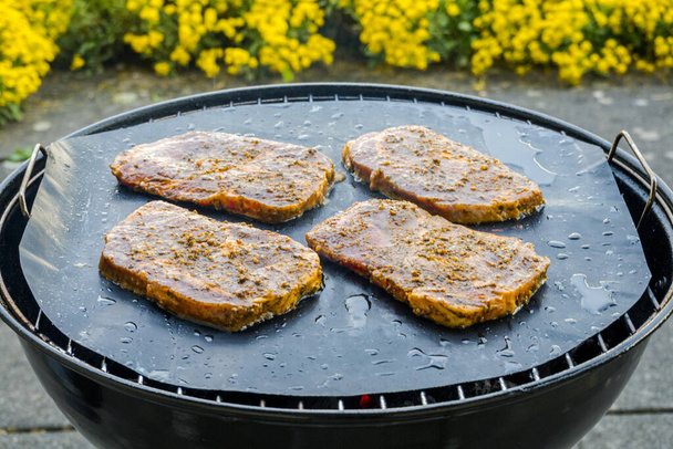 Pork steaks grilled outdoors. Food background - Photo, Image