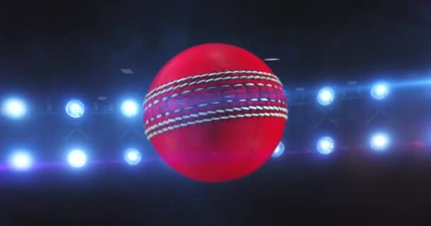 Pallone da cricket volante con riflettori lampeggianti dello stadio durante la notte. Pallone sportivo rotante. Sport 4k sfondo video in loop infinito. - Filmati, video