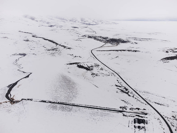 Aerial view of some roads with snow in winter. - 写真・画像