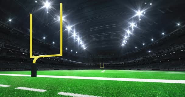 American football stadium and view behind the yellow goal post on grass field with glowing spotlights on the top. Sport advertisement 4K video loop. - Footage, Video